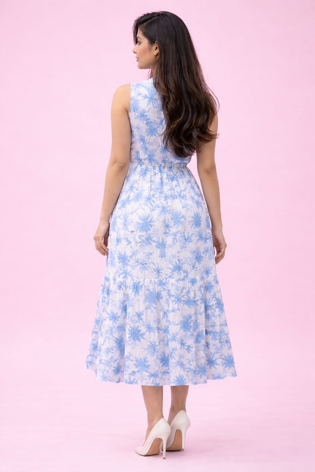 Back view of blue white floral print sleeveless midi dress for women
