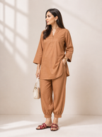 Woman wearing camel brown linen  kurta set with relaxed-fit kurta and tapered pants