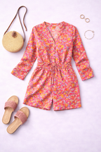 Flat lay of floral print and fabric on women’s summer jumpsuit