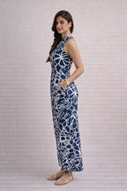 Side view of navy blue floral rayon wide leg jumpsuit for women