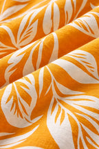 Close-up of fabric on orange culottes coord set for women