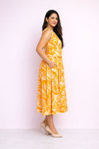 Side view of orange culottes coord set for women