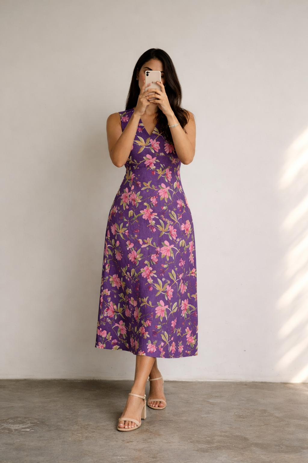 Purple floral sleeveless midi dress styled for brunch and summer outings